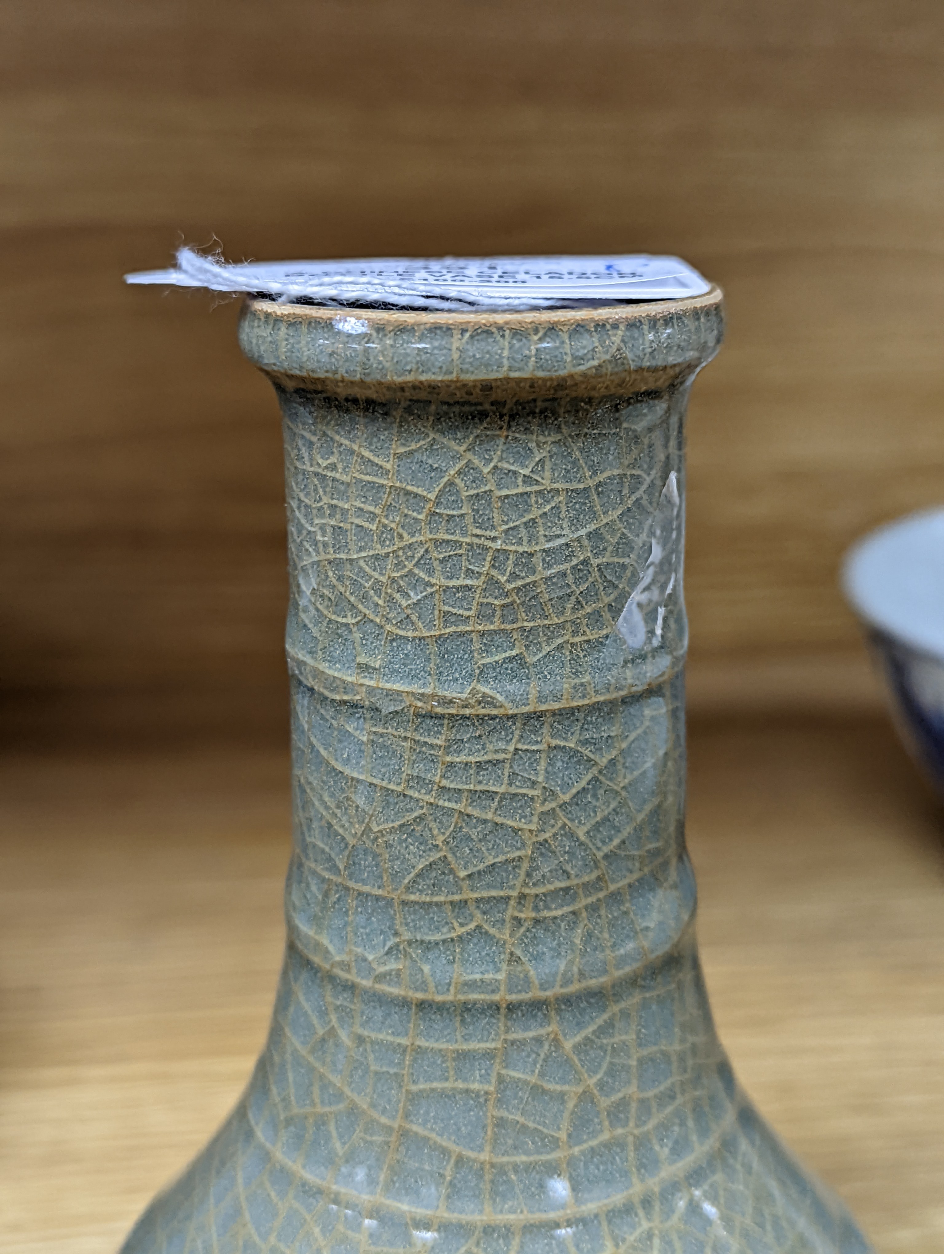 A Chinese celadon bottle vase 15.5cm